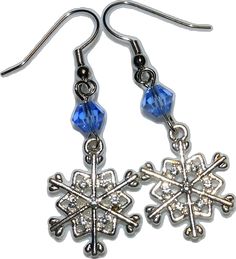 Elegant Christmas Jewelry With Dangle Shape, Elegant Christmas Holiday Jewelry, Silver Snowflake Jewelry For Christmas, Sterling Silver Snowflake Jewelry, Bling Dangle Earrings For Gift, Dangle Earrings With Bling For Gift, Gift Crystal Dangle Earrings With Sparkling Detail, Silver Snowflake Sterling Silver Jewelry, Holiday Dangle Jewelry