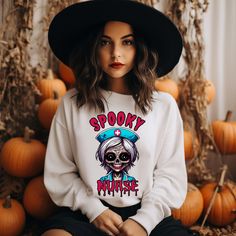 Get ready for Halloween with our Spooky Nurse Halloween Sweater! Featuring a terrifying nurse graphic and creepy fonts, this sweater is perfect for nurses who love to embrace the spooky season. Whether you're looking for a unique Halloween costume, a fun gift for a nurse, or just some medical-themed apparel, this sweater has you covered. Made from high-quality materials, it's comfortable and durable for all your Halloween festivities. Stand out this Halloween with our Spooky Nurse Sweater! Ideal White Halloween Cosplay Top, White Top For Halloween Cosplay, Creepy Fonts, Creepy Font, Nurse Graphic, Nurse Sweater, Nurse Halloween, Halloween Festivities, Unique Halloween Costumes