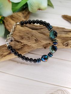 Elegant Blue Goldstone bracelet by KamarniKreationsCo on Etsy Goldstone Bracelet, Blue Iris, Nugget Necklace, Reno Nv, Blue Goldstone, Jasper Necklace, Cool Necklaces, Adjustable Bracelet, Teal Blue