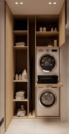 a washer and dryer in a small room