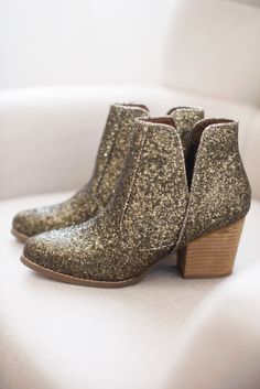 NOTHING quite says 'I'm here for the party' like a pair of glitter booties. Rubber heel and sole. 3 inch heel Fit true to size, if you are in between sizes, go with your larger size. If your foot is wide at all, also size up. Ships within 2-3 business days. Glitter Boots, Waterproof Jewelry, 3 Inch Heels, Shoe Fits, Wedding Dreams, Denim Leggings, Work Clothes, Rubber Heels, Hat Hairstyles