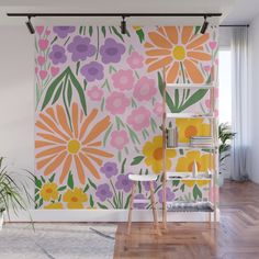 a colorful flowered wall mural in a living room