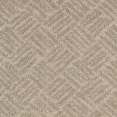 a beige carpet textured with small zigzag lines