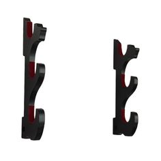 two black and red metal brackets on a white background, one with the letter s in it