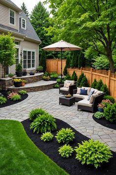 an outdoor patio with seating and landscaping