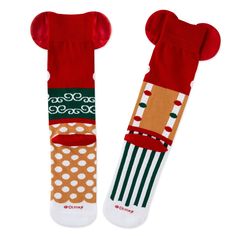 Show off your whimsical holiday style with this pair of Disney crew socks. Cute and colorful novelty socks feature a gingerbread version of Disney Mickey Mouse on one sock and a coordinating Disney Minnie Mouse design on the other. With peppermint Mickey ears attachments, a green bow accent and candy designs decorating the mismatched socks, this fun Disney footwear makes the perfect Christmas gift or stocking stuffer for a Disney fan. Disney crew socks feature mismatched but coordinating gingerb Gingerbread Designs, Mismatched Socks, Socks Cute, Disney Holiday, Green Bows, Sweet Christmas, Disney Fan, Mickey And Minnie, Holiday Style