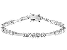 Bella Luce ® white diamond simulant 5.26ctw round, rhodium over sterling silver tennis bracelet. Measures approximately 6.25"L x 0.13"W and has a hidden box closure. The diamond equivalent weight is 3.30ctw. Fine Jewelry Cubic Zirconia Tennis Bracelet Channel Set, Elegant Silver Tennis Bracelet With Channel Set, Elegant Silver Channel Set Tennis Bracelet, Elegant Silver Tennis Bracelet Channel Set, Classic Silver Tennis Bracelet With Channel Set, Silver Cubic Zirconia Channel-set Tennis Bracelet, Channel Set Cubic Zirconia Tennis Bracelet, Silver Cubic Zirconia Channel Set Tennis Bracelet, Cubic Zirconia Channel Set Tennis Bracelet