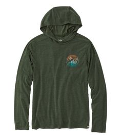 a women's hoodie sweatshirt with an image of the ocean and mountains on it