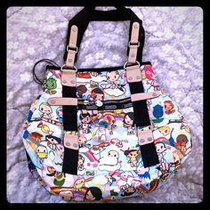 Reposhing This Tokidoki Lesportsac Bag I Purchased From @Sbn98xo. I Have Never Used It. It's A Great Bag But I Have Too Many Tokidoki Bags And Have Never Used This One As I Prefer Crossbodies. Measurements: 12" Wide, 10" Height, 5" Across The Bottom, 9" Drop. Questions? Leave A Comment Below! Multicolor Character Print Travel Bag, Multicolor Character Print Bags For Daily Use, Harajuku Multicolor Travel Bag, Harajuku Style Multicolor Travel Bag, Playful Multicolor Bags With Character Print, Playful Character Print Multicolor Bag, Playful Multicolor Character Print Bags, Multicolor Harajuku Style Shoulder Bag For Everyday Use, Harajuku Style Multicolor Shoulder Bag For Everyday Use