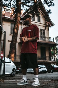 "While we love our developed streetwear insights and pristine vision, we cannot deny our inner metal soul. We pay tribute to all metalheads. \"For those about to Rock, we salute you!\" - AC/DC, 1981 100% Cotton, 215 g/sqm Screen-printed graphics Crewneck Ribbed collar" Casual Street Outfits Men, Street Wear Man Outfit, Posing Men Ideas, Street Fashion Photoshoot Men, Urban Street Photography Men, Argentina Fashion Street Style, Chill Streetwear Outfits Men, Dad Summer Outfits Men, Black Guys Fashion