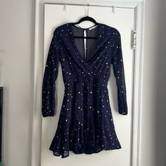 Beautiful Navy Blue With Gold Stars. Never Worn, Doesn’t Fit Me. V-Cut In Front, Keyhole Back, Super Flattering Silhouette! Fitted Blue Star Print Dresses, Blue Star Print Party Dress, Spring Star Print Dress For Date Night, Long Sleeve Star Print Dress For Night Out, V-neck Star Print Party Dress, Blue Spring Dress With Star Print, Fitted Star Print Spring Dress, Blue Star Print Dress For Spring, Spring Blue Dress With Star Print