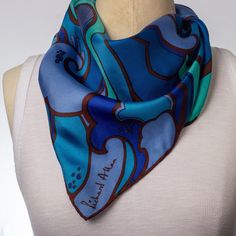 Famed silk designer Richard Allan created some of the most artistic, expressive, scarves and pocket squares in the 1960s. His creations are most often framed as they truly do have an art-first approach to their design. This beautiful 100% silk scarf is designed with the clear inspiration of the ocean and arriving tides. Hand rolled edges frame this exciting piece that offers lively color combinations of blues, greens and chocolate lines. Measurement: 27"x27" See the whole collection in our shop! Just click https://ownsomevintage.etsy.com/ Blue Vintage Silk Scarf For Gift, Vintage Blue Silk Scarf As Gift, Vintage Blue Silk Scarf For Gift, Blue Vintage Silk Scarf For Formal Occasions, Vintage Blue Silk Scarf For Formal Occasions, Blue Vintage Silk Scarf, Vintage Blue Silk Scarf, Chocolate Line, Vintage Bandana