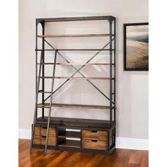 a book shelf with drawers and shelves on the bottom, in front of a white wall