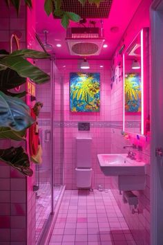 a bathroom with pink walls and tiled floors