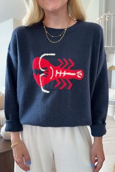 A dreamy and fun knit sweater! The You're My Lobster Sweater is a the perfect lightweight sweater for fall. Featuring a navy color, lobster motif, knit fabric and a true to size fit. Style this cozy knit with red shorts or pants for a fun, fall look! Details & Sizing Navy color Lobster motif Knit fabric True to size fit Gabriella is wearing a size S Fabric 52% Acrylic 18% Polyester 18% Nylon 10% Wool 2% Spandex Shipping & Returns We offer free ground shipping on USA domestic orders. We do not of Casual Navy Knitted Sweater, Lobster Sweater, You're My Lobster, My Lobster, Cozy Knit, Red Shorts, Lightweight Sweater, Sweater Set, Cozy Knits