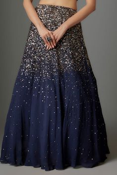 Navy blue can can attached lehenga with sequin embroidery. Comes with padded embellished blouse. - Aza Fashions Blue Sequined Lehenga For Party, Party Wear Blue Anarkali Set With Sequins, Blue Sequined Anarkali Set For Party, Blue Georgette Anarkali Set With Sequins, Blue Hand Embellished Anarkali Set For Festive Occasions, Designer Blue Sequined Sharara, Blue Sequined Sharara For Eid, Floor-length Sequined Sharara For Festivals, Blue Sequin Dress For Navratri