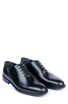 Handsome, polished and easy to wear, this wardrobe-staple leather oxford sports minimal detailing to give it maximum versatility across your formal wardrobe. Lace-up style Leather upper and lining/synthetic sole Made in Turkey Classic Oxford Shoes With Brogue Detailing For Work, Sleek Black Oxfords, Classic Oxford With Leather Sole For Workwear, Classic Oxford Shoes With Leather Sole For Work, Fitted Leather Sole Oxford For Workwear, Black Oxfords For Work, Modern Black Oxfords For Formal Occasions, Modern Black Formal Oxfords, Fitted Leather Sole Oxford Shoes For Work