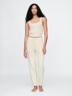 Supersoft cotton-blend pajama joggers.  Elasticized waist with drawcords.  Fit: Classic.  An easy silhouette that fits close  at the waist, and is relaxed through the hips and thigh.  Models wearing Gap Pajama Joggers, Lounge Outfits, Easy Silhouette, Plush Yarn, Everyday Luxury, Everyday Luxuries, Cream Beige, Toddler Gifts, New Woman