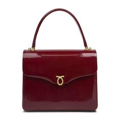 Royale Handbag in Patent Wild Cherry/BlackOf  true royal pedigree, this bag is a favorite of H.M. Queen Elizabeth II. An elegant blend of linear and curved forms, this piece is wonderfully British. Designed and manufactured by Launer London, this piece is crafted to the highest possible standards. Only the finest calfskin leathers sourced from Italy are used to create this piece. The interior is equally striking and features fine Italian suede linings.While we do not stock these soft leather han Launer London, Modern Handbag, Statement Handbag, Soft Leather Handbags, Wild Cherry, London Bags, Modern Bag, Patent Leather Handbags, Elegant Bags