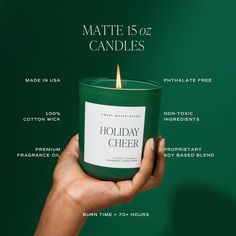 a hand holding a green candle with the words holiday cheer on it and information about candles