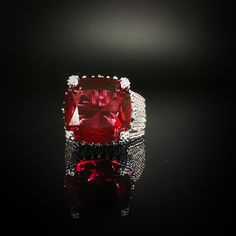 10 Carat Red Zircon Ring ✰ Crafted with precision, this eye-catching ring is made from copper and plated with 18k white gold, ensuring both durability and a luxurious shine. The adjustable design allows for a perfect fit, making it a versatile and chic accessory for any occasion. ✰ This ring is not only suitable for formal occasions such as banquets, weddings, theme parties, but also for everyday wear ✰ Perfect for romantic dates, formal dinners, or special occasions, this ring adds a finishing Egg Styles, Theme Parties, Ring Crafts, Zircon Ring, Romantic Dates, Chic Accessories, Gold Plated Silver, Cocktail Ring, Cocktail Rings