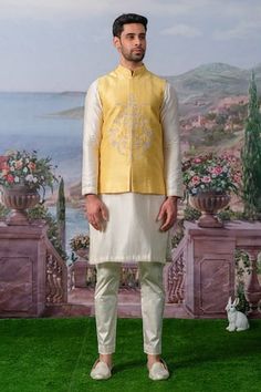 Yellow bundi with floral embroidery using zari, pearl, sequin. Paired with an inner kurta and pant. - Aza Fashions Floral Stand, Kurta Set Men, Nehru Jacket, Nehru Jackets, Kurta Set, Yellow Floral, Aza Fashion, Full Sleeve, Floral Embroidery