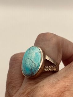 Vintage Blue Larimar with citrines ring 925 Sterling Silver with accents of gold rhodium  Size 7 My jeweler can re size it for a $20 fee All rings are shipped in a nice gift box.   Check out our over a THOUSAND great reviews Engraving is $4 per letter and is not always perfect depending on the piece. It can take a few days if the jeweler is busy. This is payable to Paypal Judithsltd@gmail.com Sterling Silver Turquoise Ring In Yellow Gold, Sterling Silver Turquoise Ring With Yellow Gold Gemstone, Luxury Oval Turquoise Gemstone Ring, Turquoise Gemstone Ring In Yellow Gold Sterling Silver, Elegant Gold Turquoise Cabochon Ring, Gold Turquoise Ring Gift, Gold Turquoise Ring For Gift, Luxury Turquoise Ring Jewelry, Luxury Turquoise Anniversary Ring