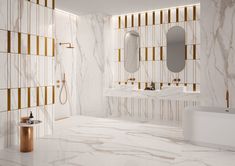 a bathroom with gold and white tiles on the walls, two sinks and a bathtub