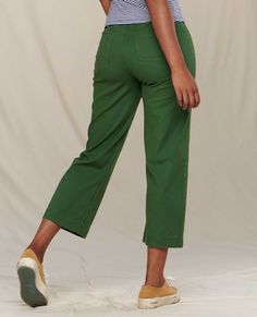 Holy crop! The Earthworks Wide Leg Pant is our high-waisted take on a classic with just enough trim to keep you dancing between tidepools. Perfectly paired with a simple tee, these pants have it all: soft-brushed feel, fitted thigh to keep things snug, and organic cotton/TENCEL™ Lyocell/elastane blend to keep 'em flexible. These ain't your mama's cargos. But she'll definitely want to steal them.Details Moisture-wicking Comfort stretch OEKO-TEX® STANDARD 100 approved fabric Flexform waistband tec Green Relaxed Fit Cropped Bottoms, Everyday Green Wide Leg Bottoms, Green Wide-leg Bottoms For Everyday, Green Wide Leg Bottoms For Everyday, Green Cropped Leg Bottoms For Work, Everyday Wide Leg Green Bottoms, Versatile Green Wide Leg Straight Pants, Green Relaxed Fit Work Pants For Spring, Versatile Green Straight Wide Leg Pants