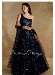 Made to Order/Measurement/Custom Order Lehenga - Color : black - Fabric : Embroidered Net - Fully flared paneled lehenga - Embroidered  Blouse - Drawstring closure with Tassels - - It can be customize in any design or size  PLEASE NOTE: BUYERS ARE RESPONSIBLE FOR ANY CUSTOMS AND IMPORT TAXES THAT MAY APPLY. This is a made to order product. If you opt for 'Made To Measurement Option', we will provide a measurement template and you can share the measurements likewise. If you want to opt for 'Standard Size', Please refer to the size chart provided in the listing. Shipping: Standard Shipping is done by DHL ecommerce and it mostly takes 2 to 3 weeks to deliver after dispatch. Express Shipping is done by DHL express and it mostly delivers within a week after dispatch. Fabric Care : Dry Clean Onl Black Dress With Pallu For Evening, Black Saree With Sheer Dupatta For Reception, Black Sequined Gown For Wedding, Black Gown With Sheer Dupatta For Evening, Black Sequined Wedding Gown, Black Evening Gown With Sheer Dupatta, Fitted Black Gown With Sheer Dupatta, Black Fitted Gown With Sheer Dupatta, Black Gown With Sheer Dupatta For Festive Occasions