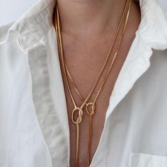 Gold Filled Knotted Lariat Necklace | Herringbone Snake Chain Y Necklace | Gold Mini Cube Chain Link Layering Necklace | Long Drop Necklace Super chic and minimal that goes well with all outfits. Adjustable, you have a choice of clasping it at 20" or 22" Lariat necklace with 3" drop in the center. Check out more styles: https://jordanskyjewelry.etsy.com Handmade and designed in NY. ------------------------------- M A T E R I A L S  18K gold filled  Thanks for supporting our small business❤︎ ---- Gold Lariat Necklace Simple, Luxury Lariat Toggle Necklace With Chain, Everyday Metal Lariat Necklace With Adjustable Chain, Chic Chain Necklace For Jewelry Making, Metal Lariat Necklace With Chain, Metal Lariat Necklace With Chain Detail, Trendy Lariat Necklace With Adjustable Chain, Metal Lariat Necklace, Adjustable Length Metal Lariat Necklace