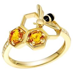 14K Yellow Gold Ring (Matching Earrings and Bracelet Available) Diamond 10-0,043 ct Citrine 2-0,495 ct Enamel 2-0,05 ct Weight 2,74 ct Size 6.5 With a heritage of ancient fine Swiss jewelry traditions, NATKINA is a Geneva based jewellery brand, which creates modern jewellery masterpieces suitable for every day life. It is our honour to create fine jewelry, and it’s for that reason that we choose to only work with high-quality, enduring materials that can almost immediately turn into family heirlooms. From our selection of precious metals set with genuine precious stones, you can be assured that NATKINA is for everyday life and FOREVER. With a heritage of ancient fine Swiss jewelry traditions, NATKINA is a Geneva based jewellery brand, which creates modern jewellery masterpieces suitable fo Bee Ring, Ring Matching, Modern Jewellery, Jewellery Brand, Ring Diamond, Yellow Gold Ring, Girls Best Friend, Modern Jewelry, Yellow Gold Rings