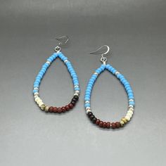 These stunning handcrafted Southwestern style earrings contains high grade, smooth, round Genuine Czech Preciosa glass seed beads finished with stainless steel jewelry findings. Each bead in the earrings is hand selected, then strung on professional quality bead wire to ensure the best quality. Matching bracelet and necklace available for purchase separately.  Bracelet https://www.etsy.com/listing/1456003523/southwestern-seed-bead-bracelet-4mm?click_key=ff434f2dfa1baec434e59ced41b57905aa64d490%3A1456003523&click_sum=e4890a6f&ref=shop_home_active_1&sts=1 Necklace https://www.etsy.com/listing/1455933027/southwestern-seed-bead-necklace-4mm?click_key=bc229c1914c9b14c20e2680a489c55dfba2ae5a0%3A1455933027&click_sum=58bab486&ref=shop_home_active_3&sts=1 HANDMADE with love, care, and attention to Earrings Native American, Native American Style, Earrings Turquoise, Native American Fashion, Seed Bead Necklace, Seed Bead Bracelets, Earrings Blue, Seed Bead Earrings, Matching Bracelets