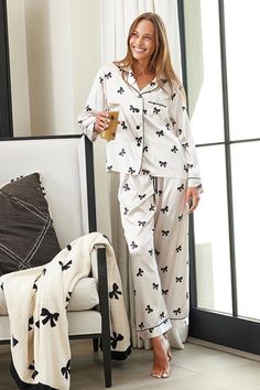 You never know who you'll meet in your dreams! Our silky satin pajamas are perfect for cozy nights in, slumber parties, or lazy Sunday mornings. • These pajamas are machine washable and easy to care for, making them a practical and stylish choice • Upgrade your sleepwear collection with our new line of pajamas and feel fabulous every night Bow Pajamas, Pretty Pajamas, Lounging Outfit, Long Sleeve Pajamas, Wrangler Accessories, Satin Midi Skirt, Lazy Sunday, Satin Pajamas, Slumber Parties