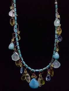 Amazing Laura Gibson Necklace. Sterling Silver Links and Closure. Sweet candy gems dangling in an artistic manner. Following gems are present: Apatite, Peridot, Opal Chalcedony, Lemon Topaz, Turquoise and Prehnite.. Condition: Shows no Wear. Details: 17in length 20.1 grams total weight Multicolor Turquoise Necklace With Gemstone Beads, Green Multi-stone Dangle Jewelry, Bohemian Multi-stone Dangle Jewelry, Turquoise Briolette Gemstone Necklace, Turquoise Briolette Gemstone Bead Necklaces, Blue Multi-stone Necklace For Jewelry Making, Elegant Turquoise Multi-stone Necklaces, Elegant Turquoise Multi-stone Necklace, Turquoise Gemstone Dangle Necklaces