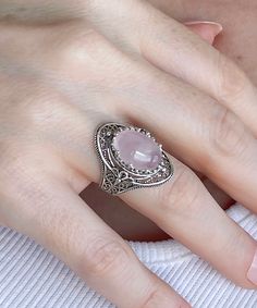 Rose Quartz Silver Filigree Floral Women Ring, 925 Sterling Silver Artisan Made Oval Women Statement Ring, Handmade Boho Cocktail Ring Crystal quartz ring, anniversary gift, bohemian hippie ring, pink quartz ring, oval stone ring, boho wedding gift Gemstone: Rose Quartz 10x14 mm. -The stone used in this jewelry, Rose Quartz, is the January Birthstone. Material: 925 Sterling Silver ( NICKEL FREE ) A bold and beautiful statement ring, this Filigree Agate Silver Victorian Floral Ring is stunning. The intricately woven floral design creates a feminine look with the dainty filigree detailing and Rose quartz gemstone. Our handcrafted 925 Sterling Silver Artisan Made Gothic Wedding Rings are handmade and labor. FREE, FAST AND TRACKABLE SHIPPING FOR ALL EU COUNTRIES AND USA. COMES WITH VELVET POUC Oval Cabochon Crystal Ring For Gift, Oval Crystal Ring Stamped 925, Gift Crystal Ring With Oval Cabochon, Silver Oval Flower Ring Hallmarked, Silver Filigree Ring With Stone Setting, Silver Oval Hallmarked Flower Ring, Oval Cabochon Filigree Jewelry For Anniversary, Oval Crystal Ring For Jewelry Making, Round Filigree Ring With Gemstone