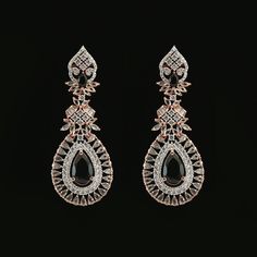 Long teardrop wedding party wear Pear shape zircon and clear crystal rhinestone dangle earrings for women and girls. Earrings lock is press or post type. This Rose gold plated drop earrings jewellery can be used on marriage,engagement,birthday and any occasion. Earrings Length: 3.2 inches. Rose Gold Cubic Zirconia Drop Bridal Earrings, Elegant Pear-shaped Party Earrings, Rose Gold Cubic Zirconia Teardrop Earrings For Party, Black Diamond Earrings For Wedding, Black Earrings With Diamond Accents For Wedding, Diamond Teardrop Pear-shaped Earrings For Party, Black Wedding Earrings With Diamond Accents, Black Diamond Accent Earrings For Wedding, Pear-shaped Cubic Zirconia Chandelier Earrings For Party