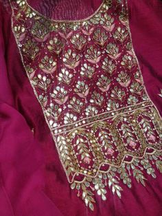 Item Overview ATHARVA Hand Embroidery Salwar Kameez w/Embroidery Neck Maroon/Banarsi Silk Dupatta/Gota Patti/ Custom Stitch/Anarkali/Patiala/ Dno. CH1556 Fabric: * Shirt- Chanderi Silk - Embroidered Neck- Maroon - 2.5 Mts Beautiful Hand Embroidery * Dupatta: Banarsi Silk Dupatta-Tilla Border Dupatta- 2.5 Mts- Latkans Tassels- (Motifs may wary) * Bottom Santoon Silk 2.5 Mts. Excusive Hand Embroidered Party Wear Punjabi Suit. Customization: * Fabrics Customization: Designs Can be made in different Semi-stitched Jamawar Sharara With Gota Work, Traditional Draped Lehenga With Mirror Work In Jamawar, Festive Anarkali Sharara With Mirror Work, Festival Kurta With Mirror Work In Raw Silk, Raw Silk Kurta With Mirror Work For Festivals, Unstitched Jamawar Salwar Kameez With Gota Work, Bollywood Style Raw Silk Kurta With Dupatta, Gold Churidar With Mirror Work And Straight Kurta, Anarkali Style Sharara With Gota Work In Jamawar