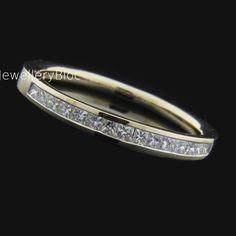 Elevate her style with an elegant CZ diamond wedding band. These diamond simulant CZ rings, crafted in recycled gold and available in 10k, 14k, and 18k gold, offer a stunning, eco-friendly choice. Perfect as a wedding band for women, an anniversary ring ami, or a stylish wedding ring set, these bands make an affordable yet luxurious birthday gift or ring for her. Whether you're looking for a stacking band or a timeless Ila engagement ring, these designs are perfect for special occasions while be Luxury Half Eternity Band With Cubic Zirconia, Luxury Women's Half Eternity Band, Luxury Half Eternity Band For Promise, Luxury Half-eternity Promise Rings, Luxury Moissanite Channel Set Eternity Band, Luxury Channel Set Eternity Band As Promise Ring, Luxury Channel Set Moissanite Eternity Band, Luxury Half Eternity Jewelry For Promise, Luxury Half Eternity Promise Bands