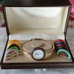 I Have A Beautiful 1980s Vintage Gucci Changeable Rings On The Watch Beautiful Piece. Gucci Watch Women, Colorful Watches, Bangle Watches, Gucci Jewelry, Gold Plated Bangles, Gucci Accessories, Women Wrist Watch