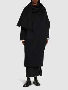 Front button closure. Non-detachable scarf panel. Horn buttons. Two side pockets. Silk lining. Model is wearing a sizeS Wool Blend Coat, Long Coat, Black Coat, Orlando, Wool Blend, The Row, Coats For Women, Black Women, Silk