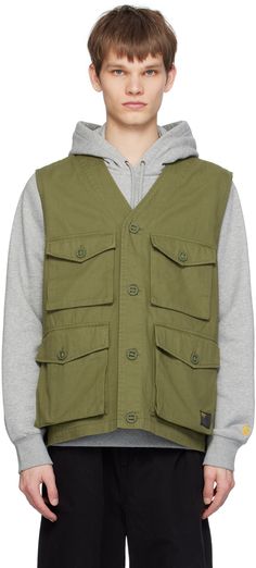 Enzyme-washed cotton twill vest. · Y-neck · Button closure · Bellows pockets at front · Logo patch at front hem Supplier color: Dundee Carhartt Work In Progress, Men Carhartt, Outerwear Vest, Carhartt Mens, Bellows, Dundee, Mens Green, Work In Progress, Casual Jacket