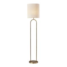 a floor lamp with a white shade on the base and a gold metal frame around it