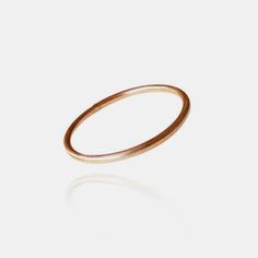 A subtle and versatile minimalist piece, this delicate lightweight thread ring is perfect for stacking or on its own as a dainty accent. Materials: 18k solid goldSize: 6 & 7 Additional Details:For this ring in a different size, please email us at info@shopthemansion.com and we can see about a special order or potential resize. Caroline Hjerpe is a small dedicated team based in Sweden, designing and making handmade jewelry since 2014. Caroline Hjerpe, Thread Ring, Making Handmade Jewelry, Sweden, Gold Bracelet, Handmade Jewelry, Ring Size, Thread, Ring