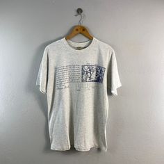 "PLEASE READ DESCRIPTION BELOW BEFORE BUYING👇🏻 *ITEM:Vintage Banana Republic Tees *ITEM DETAILS: 👇🏻 Please be aware that all vintage items will usually show a few signs of wear or fading due to age, but anything visible such as stains or holes, and serious flaws have been photographed.For any further information on this item please contact us and we will be happy to help *SIZE: MEDIUM *ACTUAL SIZE MEASUREMENT: 👇🏻 *PIT TO PIT(WIDTH):22\"INCHES *LENGTH(FROM SHOULDER): 28\"INCHES *ALL MEASURE Vintage Gray T-shirt With Text Print, Vintage Text Print Crew Neck Shirt, Vintage Print Relaxed Fit Short Sleeve T-shirt, Relaxed Fit Vintage Print Short Sleeve T-shirt, Relaxed Fit Vintage Print T-shirt, Band Merch Short Sleeve T-shirt With Vintage Print, Vintage Print Relaxed Fit Crew Neck T-shirt, Band Merch T-shirt With Vintage Print, Relaxed Fit Vintage Print T-shirt With Crew Neck