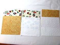 four pieces of paper laid out on top of each other with different patterns and colors