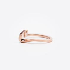 The Sera Ring features a single, delicate knot that is formed by a simple twisting line. The Sera Ring is a companion to the Amare Ring (which is the perfect engagement ring to the Sera wedding band). Both rings stand beautifully on their own, but together they become an elegant, single statement. Dimensions: 0.9" x 1" x 0.27" Available In: Platinum, Platinum with diamonds, 18K White Gold, 18K White Gold with diamonds, 18K Rose Gold, 18K Rose Gold with diamonds, 18K Yellow Gold, 18K Yellow Gold Stackable Twisted Rings For Promise, Modern Twist Stackable Twisted Promise Rings, Modern Twist Infinity Stackable Rings, Modern Twist Stackable Rings For Promise, Modern Twist Stackable Promise Rings With Polished Finish, Modern Twist Promise Ring, Adjustable Twisted Wedding Rings, Modern Twist Infinity Rose Gold Rings, Modern Twist Rose Gold Infinity Ring