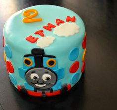 a thomas the train birthday cake on a table