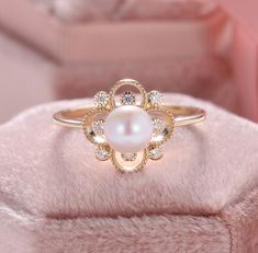 Vintage Pearl Diamond Engagement Ring, Four Leaf Clover Promise Ring, Natural Freshwater Pearl, Real Pearl Wedding Rings, Anniversary Rings ✧･ﾟ: *✧･ﾟ:* Welcome to Charles Davin Jewelry*:･ﾟ･ﾟ✧ Moissanite - a gemstone known to bring in luck in someone's life, the user can give off a look of elegance. You can give your special someone luck whilst showing your love to them. ✶Material: 10K/ 14K/ 18K ✶Main Stone: Natural Freshwater Pearl; 6.0mm ✶Side Stone: Moissanite Total: 0.07ct ✶Color: D Colorless Edwardian Pearl Ring, Luxury Pearl Promise Ring, Wedding Pearl Ring With Halo Setting, Rose Gold Pearl Ring For Anniversary, Oval Pearl Ring With Halo Setting For Wedding, Exquisite Pearl Wedding Ring, Exquisite Rings With Elegant Design For Anniversary, Exquisite Rings For Anniversary, Exquisite Wedding Pearl Ring