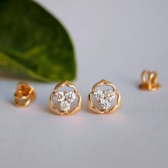 Pretty little earrings that will match perfect with any dress formal or casual These minimal earrings are also perfect for a minimal bridal look * Diamond Weight : 0.23 ct * Color-Purity : H Color, Vs-Si Purity * Gold - 1.75 gm, 14K Solid Yellow Gold (Approx) * Type - Screw back * Piercing Required Find us on Instagram for exquisite designs: @abhikajewels Like us on Facebook: www.facebook.com/Abhikajewels Thank you for visiting our shop.. :) Elegant Gold Cluster Halo Earrings, Yellow Gold Diamond Cluster Earrings With Halo, 14k Gold Diamond Halo Earrings For Wedding, 14k Gold Halo Diamond Earrings For Wedding, Yellow Gold Halo Cluster Earrings For Wedding, 14k Gold Cluster Diamond Earrings For Anniversary, Gold Diamond Cluster Earrings With Halo Design, Wedding Cluster Earrings With Halo Design In 14k Gold, 14k Gold Diamond Earrings With Halo Setting For Wedding